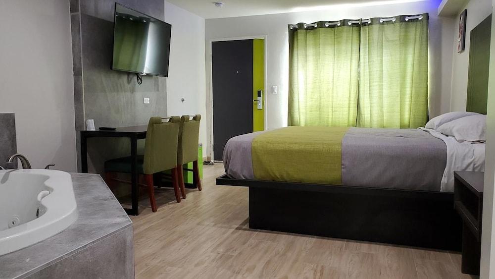 Exclusivo Inn & Suites - Featured Image