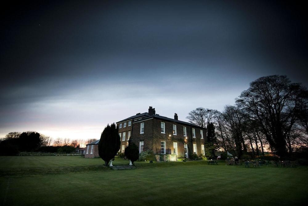 Rowley Manor Hotel - Featured Image