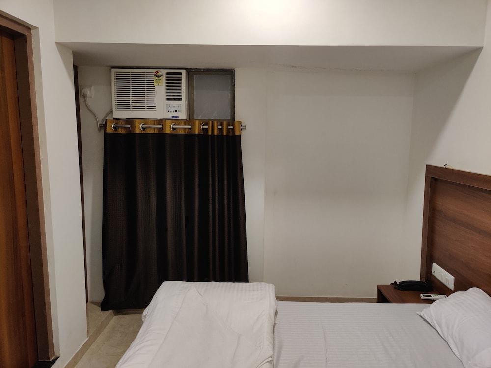 Atharva Residency - Room