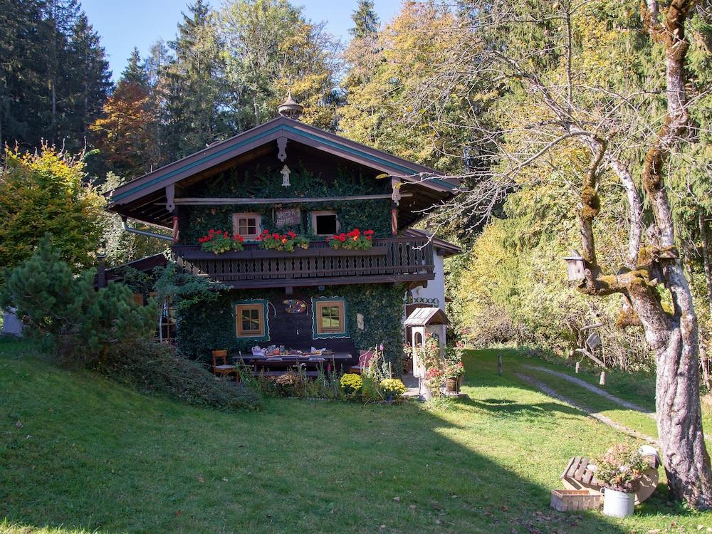 Tranquil Holiday Home in Thiersee on the Edge of the Forest - Featured Image