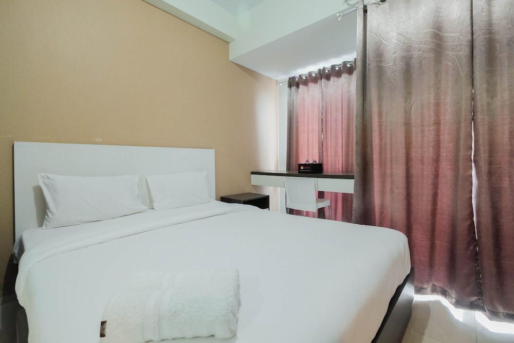 Simply Furnished Studio @ Grand Dhika City Apartment - Featured Image