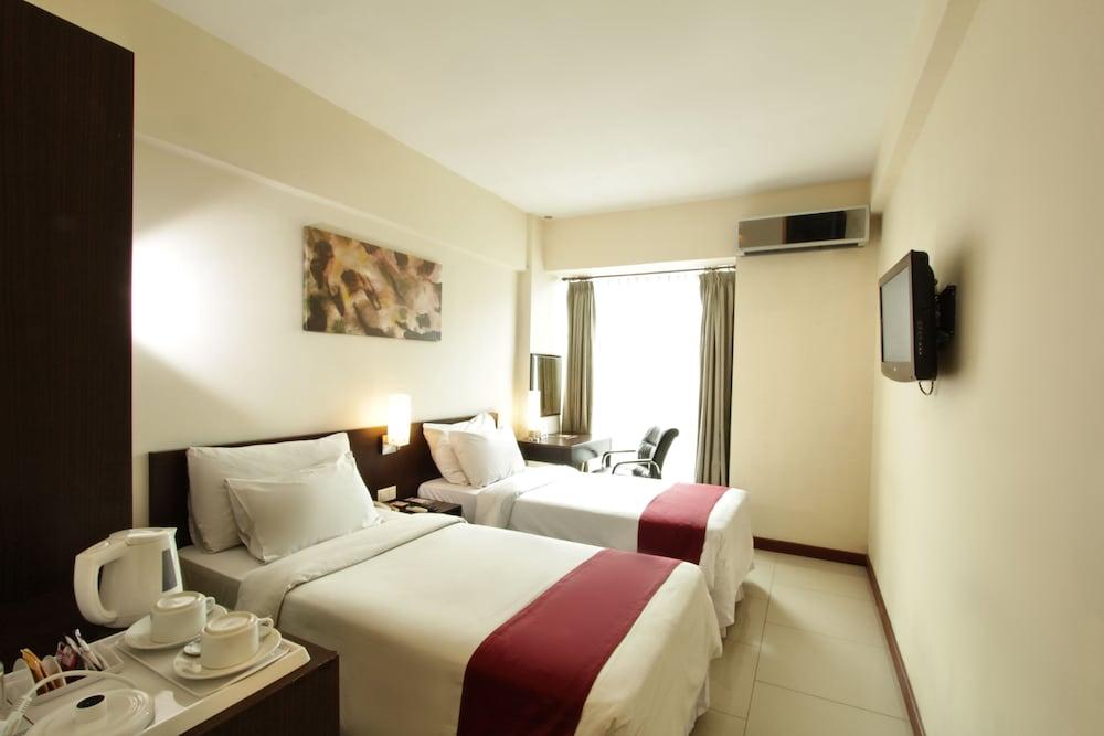 Garuda Plaza Hotel - Room